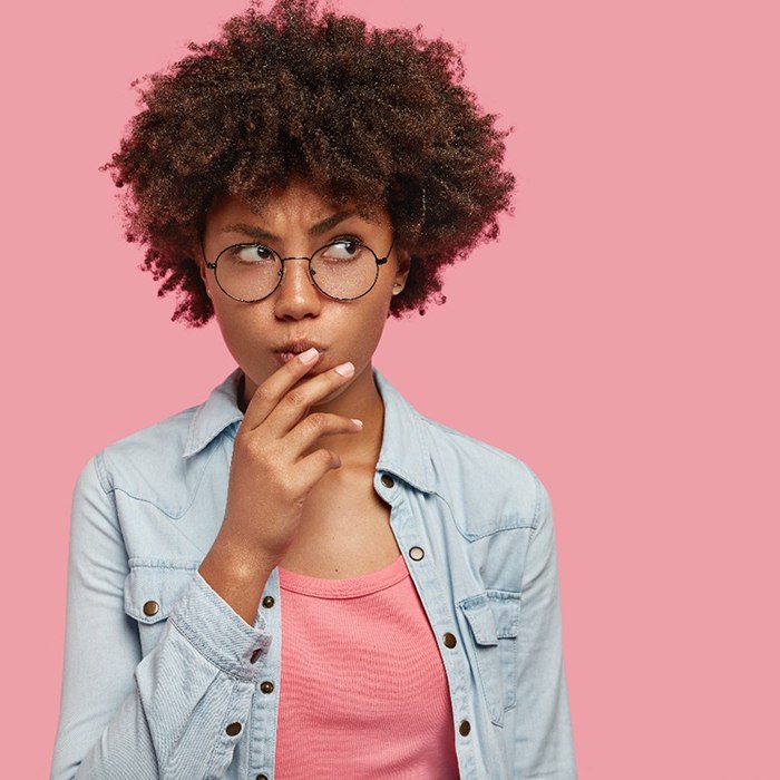 Wondering woman has questions for her Charlottesville cosmetic dentist 