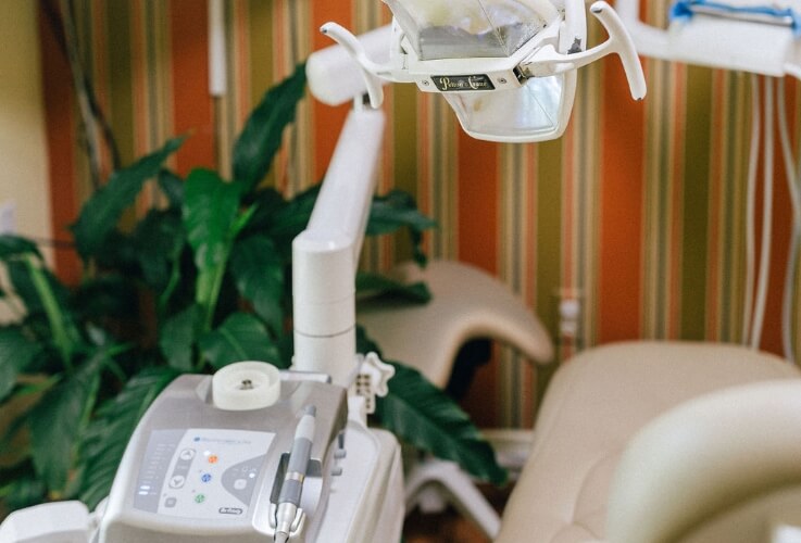 exam chair with dental tools on chair