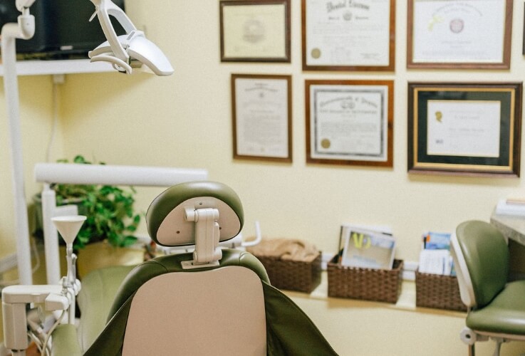 exam chair with dental tools on chair