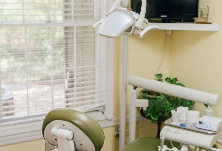 exam chair with dental tools on chair