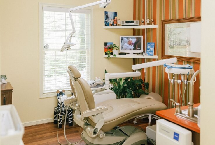 exam chair with dental tools on chair