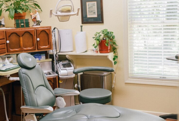 exam chair with dental tools on chair