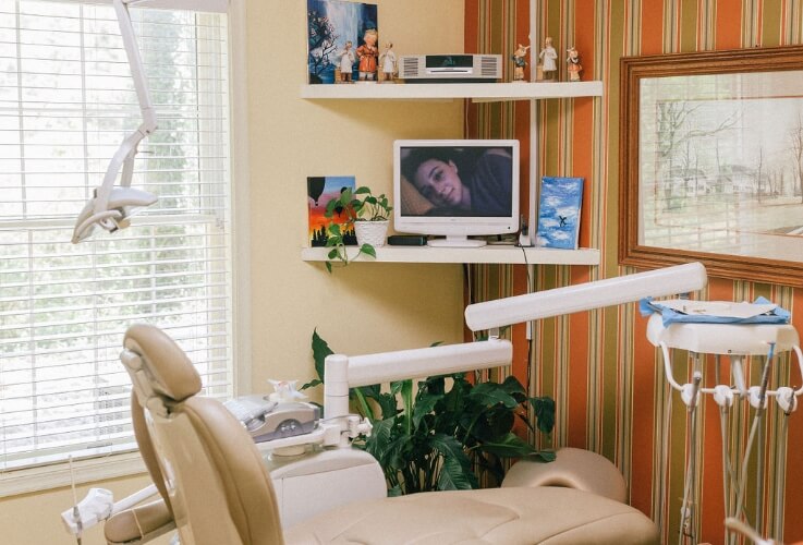 exam chair with dental tools on chair