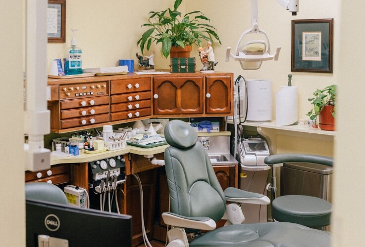 exam chair with dental tools on chair