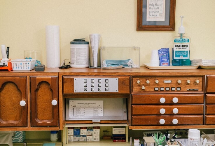 exam chair with dental tools on chair