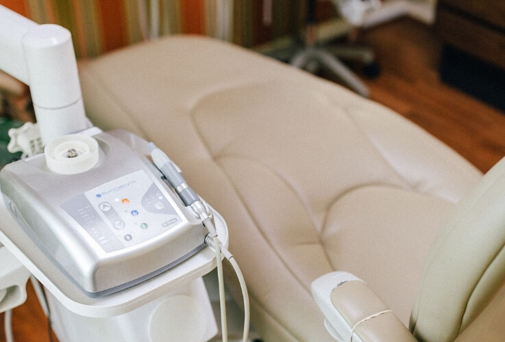 exam chair with dental tools on chair