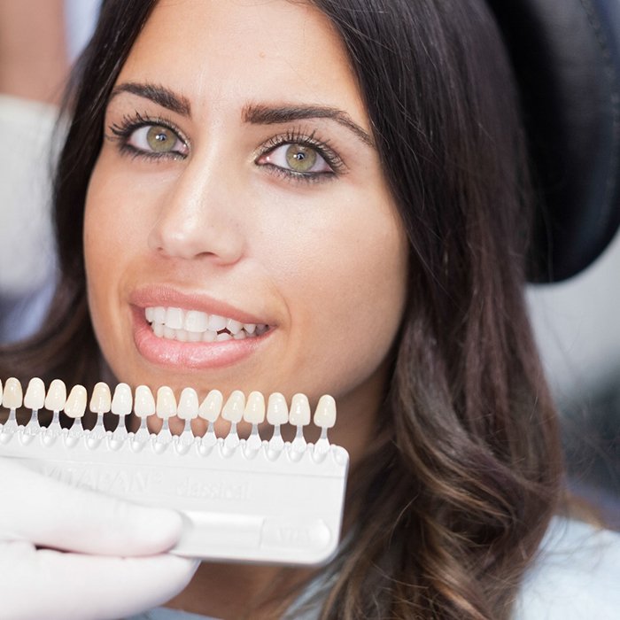 woman smiling with veneers in Charlottesville 