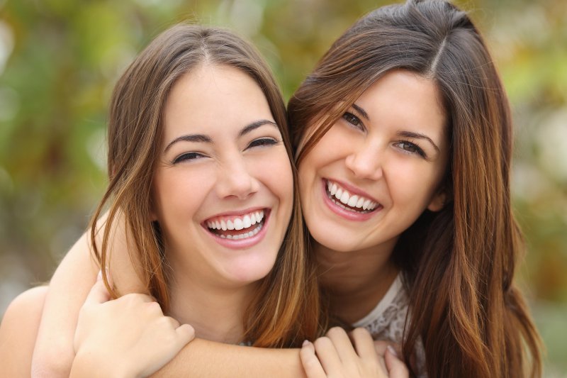 two young girls smiling